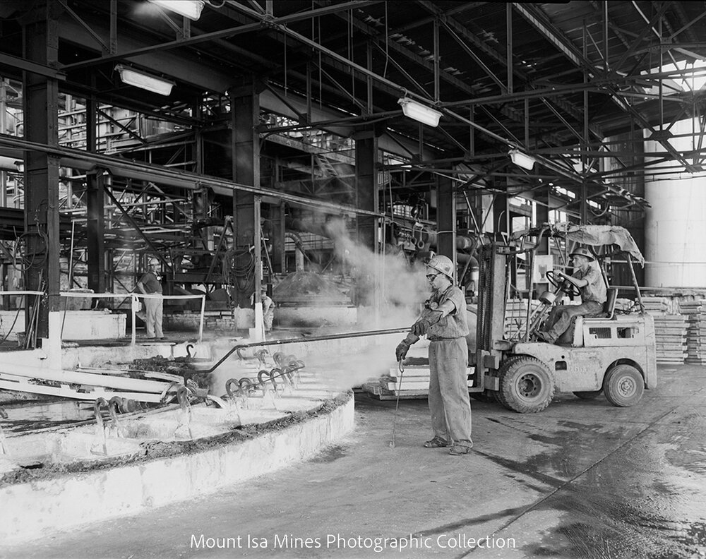 Casting lead blocks into moulds at Lead Smelter, Mount Isa Mines, March 1962