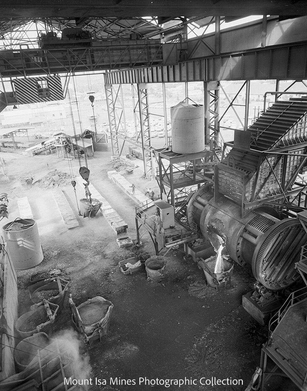 Pouring copper from converter at Copper Smelter, Mount Isa Mines, July 1962