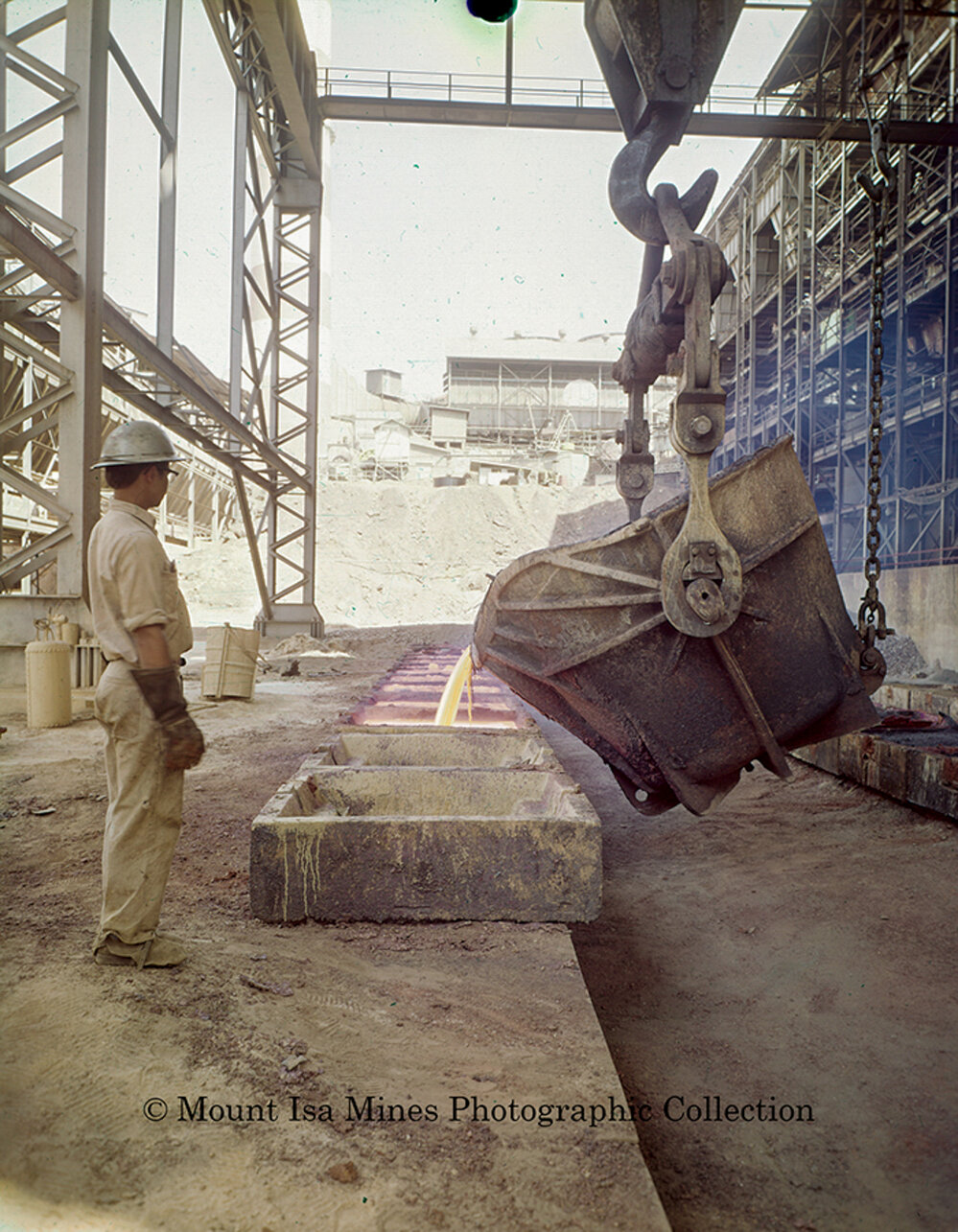 Pouring blister copper into moulds at the Copper Smelter, Mount Isa Mines, c.1970s