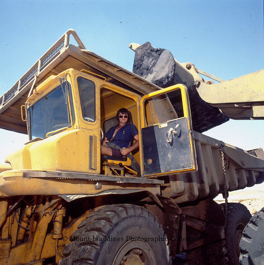 Transport department dump truck being loaded, Mount Isa Mines