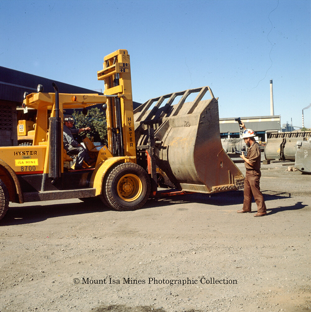 Transport department forklift with loader bucket, Mount Isa Mines
