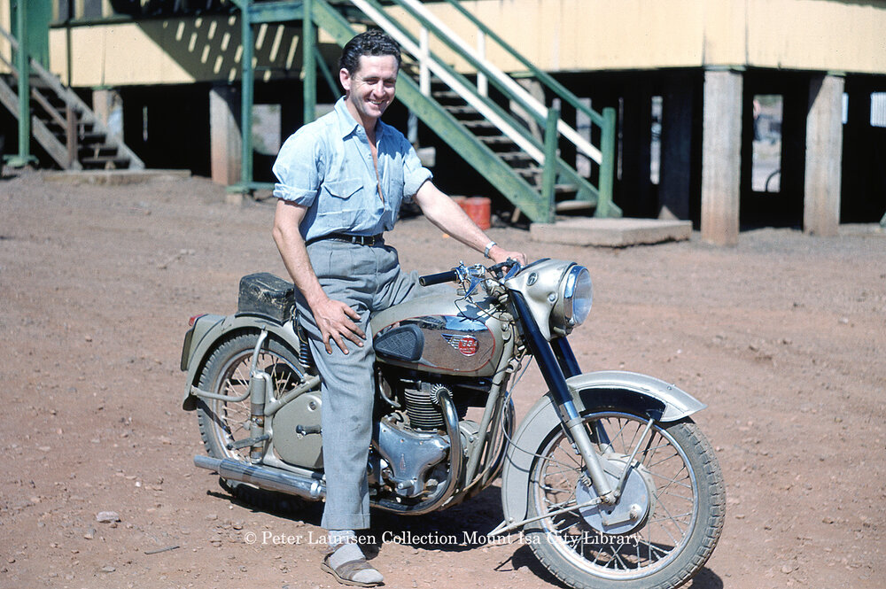 Man on BSA Motorcyle at dormitory, Mineside, c.1956