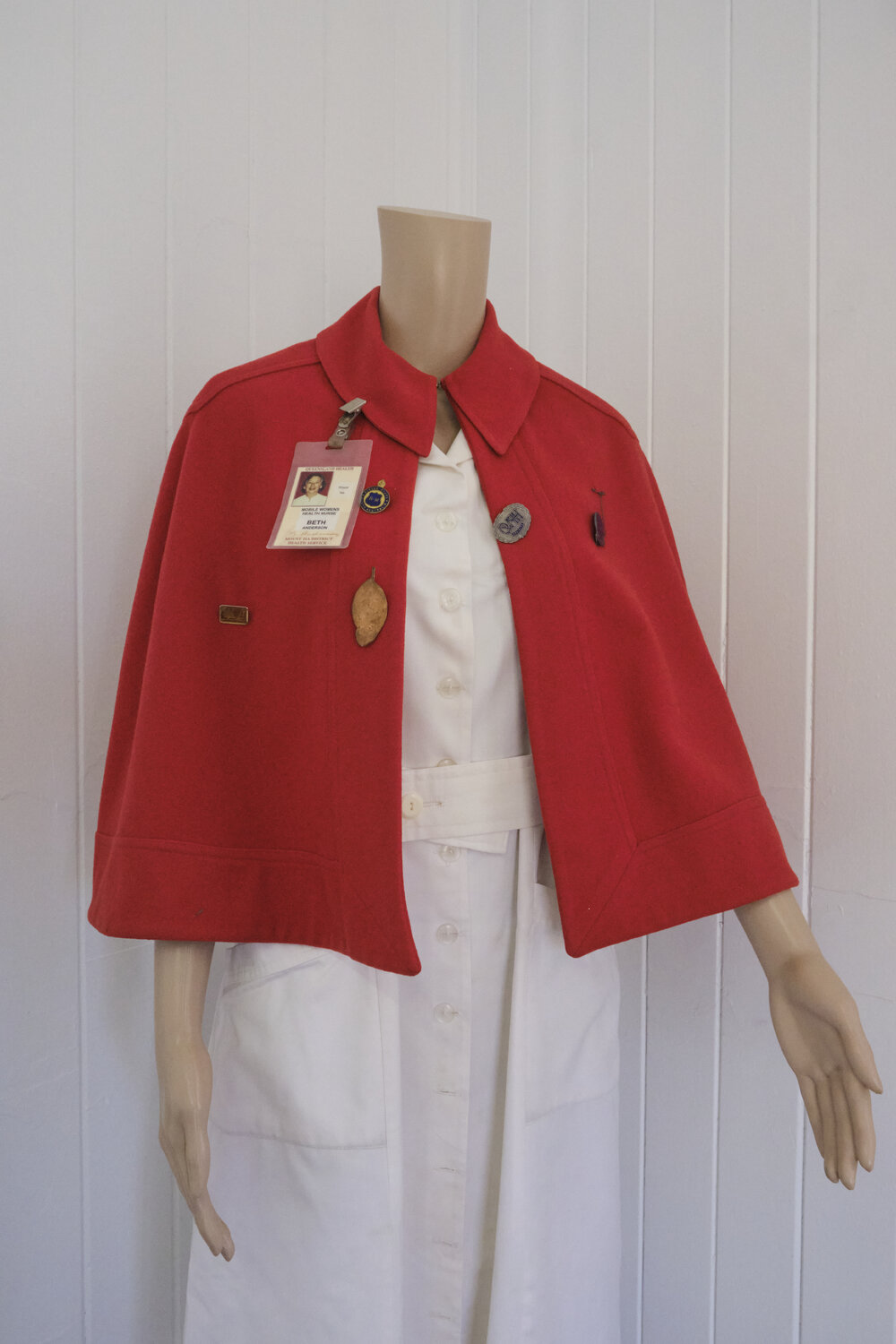 Nurse uniform with Beth Anderson's staff card, Beth Anderson Museum, May 2023