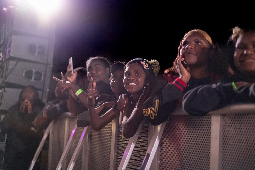 Audiences watching Daryl Braithwaite singing, Isa Street Festival, August 2023