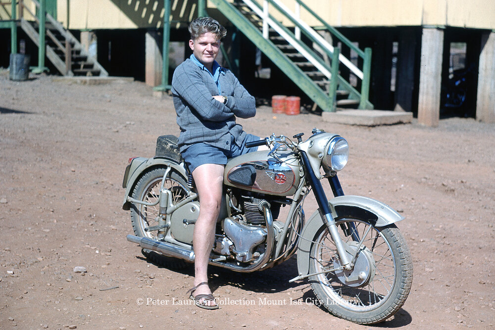 Man on BSA Motorcyle at dormitory, Mineside, c.1956