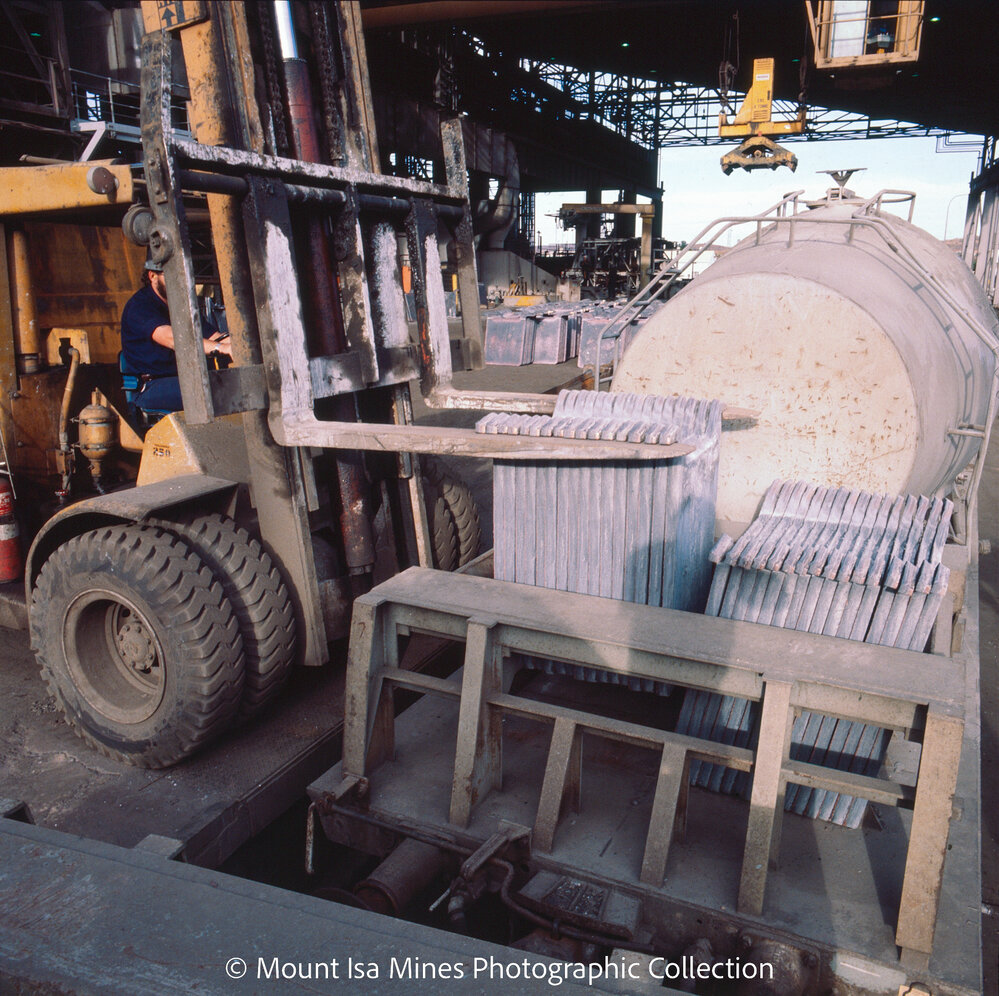 Loading anodes on railway wagon at Copper Smelter, Mount Isa Mines, January 1987