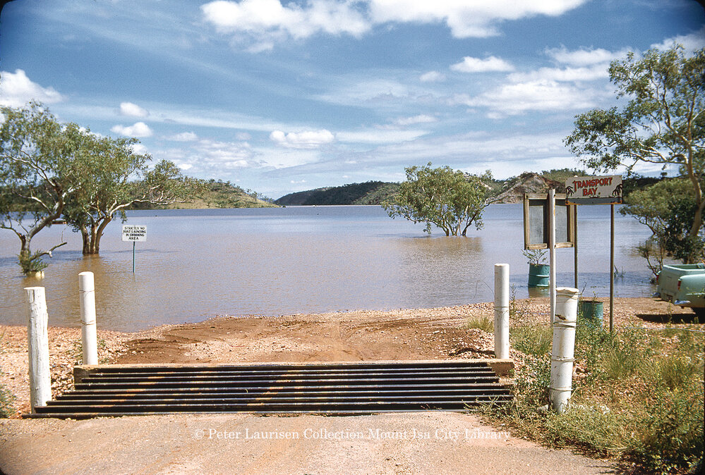 Water over spillway at Transport Bay, Lake Moondarra, March 1962