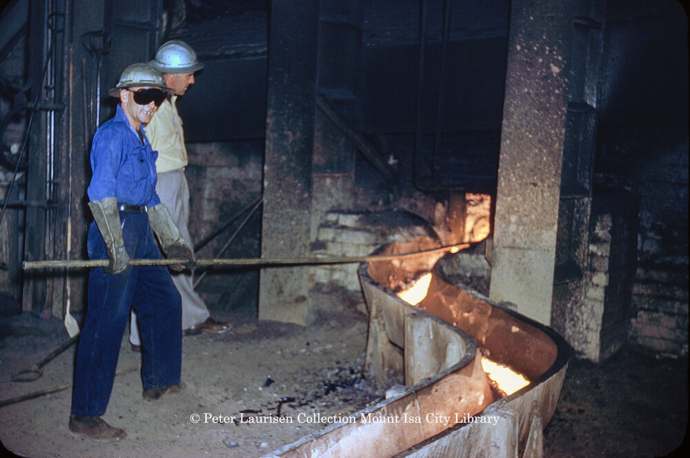 Tapping matte reverberatory furnace at Copper Smelter, Mount Isa Mines, July 1956