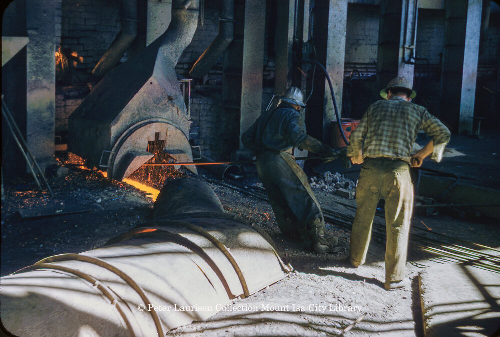 Tapping matte reverberatory furnace at Copper Smelter, Mount Isa Mines, July 1956