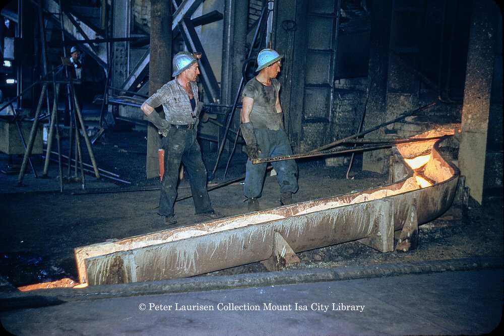 Tapping matte reverberatory furnace at Copper Smelter, Mount Isa Mines, July 1956