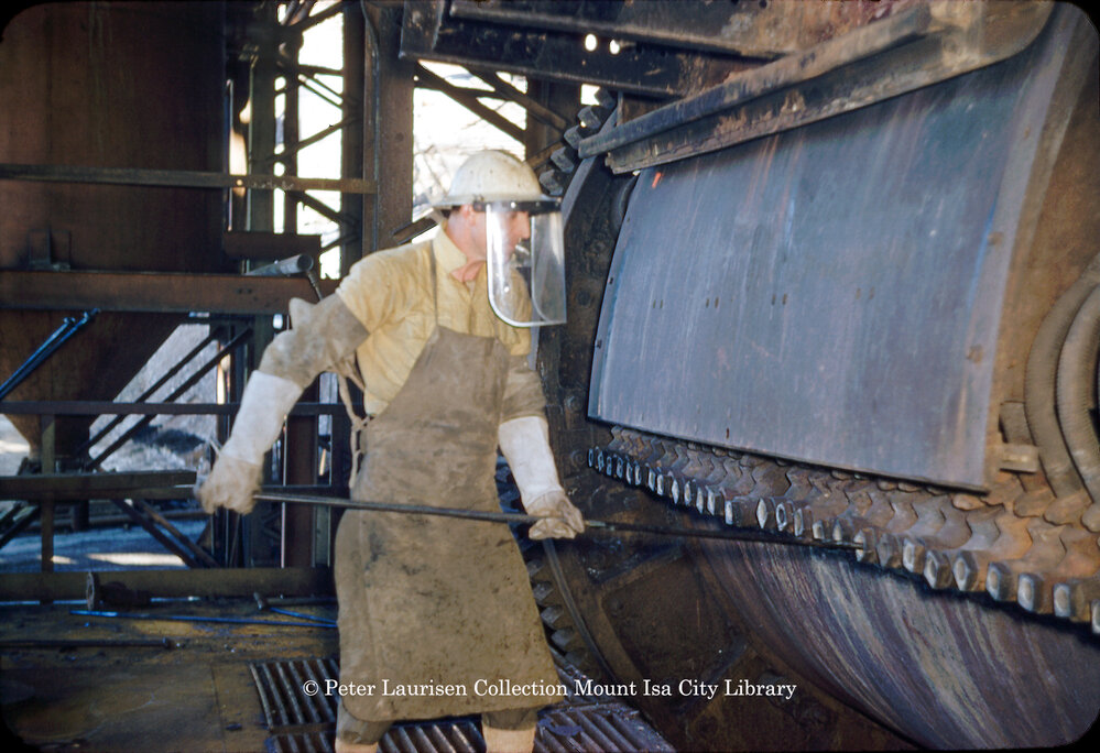 Tuyere punching on converters at Copper Smelter, Mount Isa Mines, c.1956