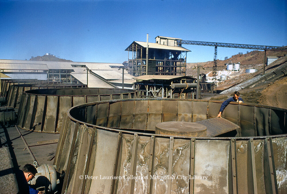 Workers inspecting marley cooling tower fans at Mines Power Station, Mount Isa Mines, July 1956