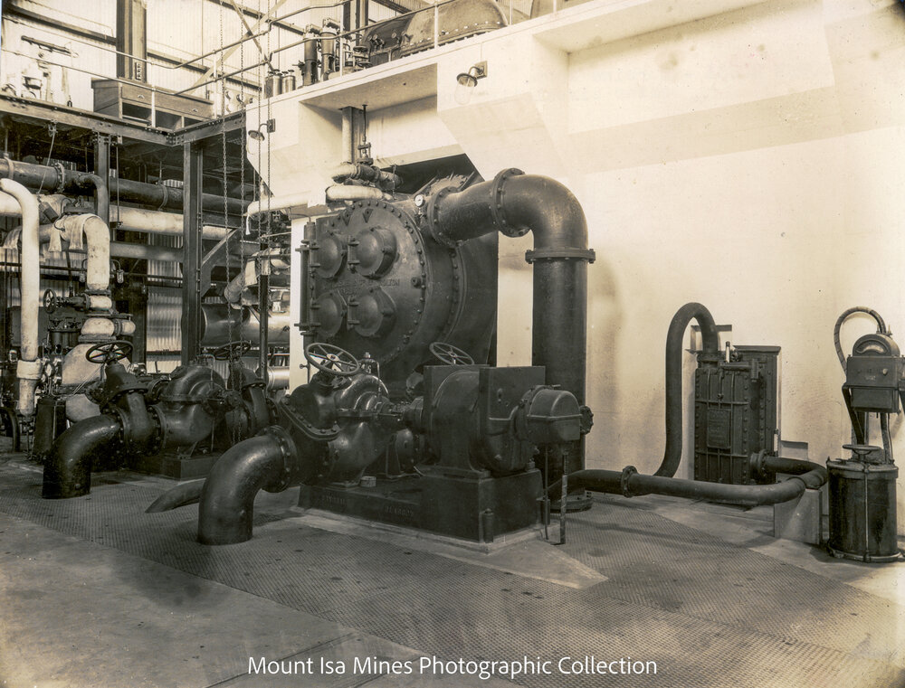 Mines Power Station turbine room steam condensers and electric water circulating pumps, Mount Isa Mines, January 1931