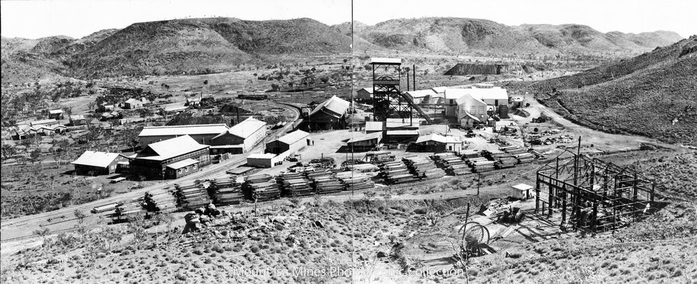 Man and Supply shaft during erection of No 2 Ore Shaft bore hole winder, Mount Isa Mines, c.1938
