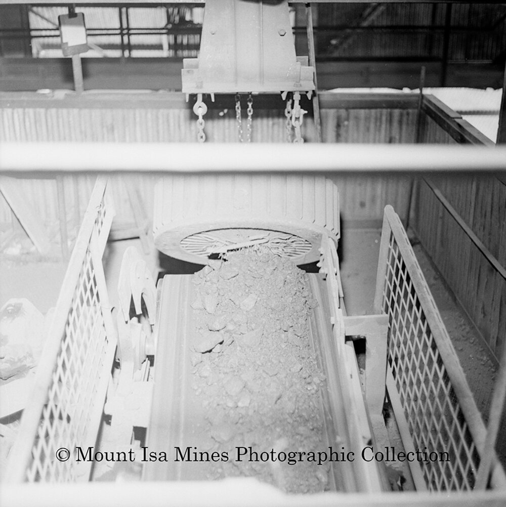 Magnet on conveyor at mill, Mount Isa Mines, November 1959