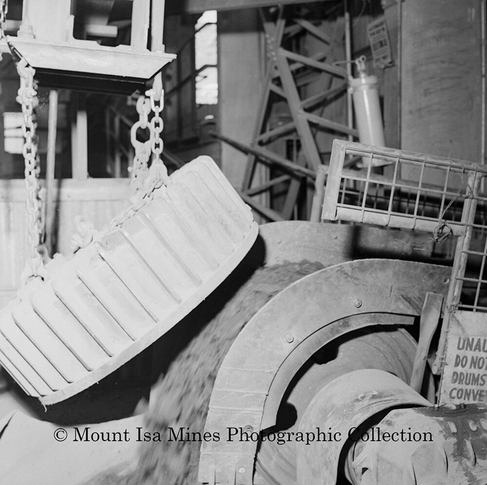 Magnet on conveyor at mill, Mount Isa Mines, November 1959