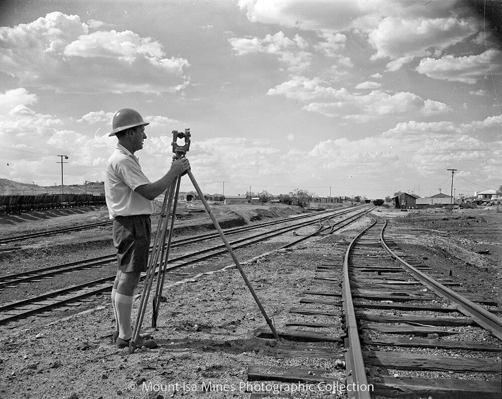 Eric Neville surveying, February 1959