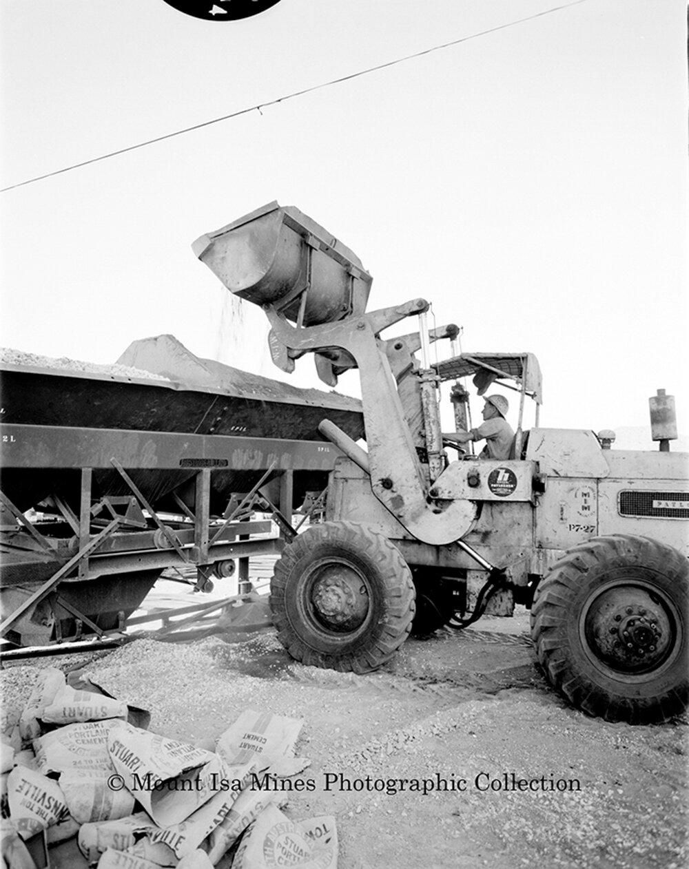 Pouring concrete at new Copper Stack, Mount Isa Mines, September 1959