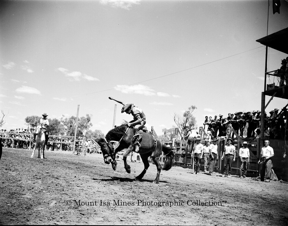 Mount Isa Rotary Rodeo Rough Riding, Spear Creek, September 1959