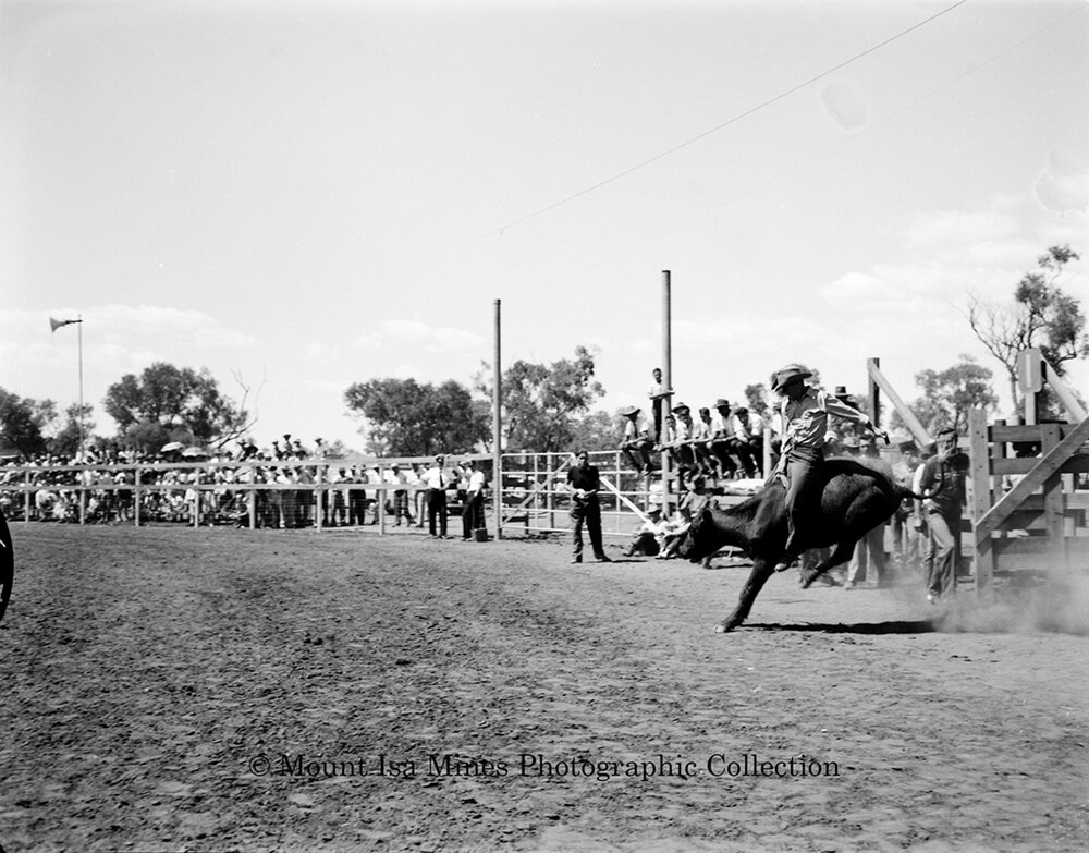 Mount Isa Rotary Rodeo Rough Riding, Spear Creek, September 1959