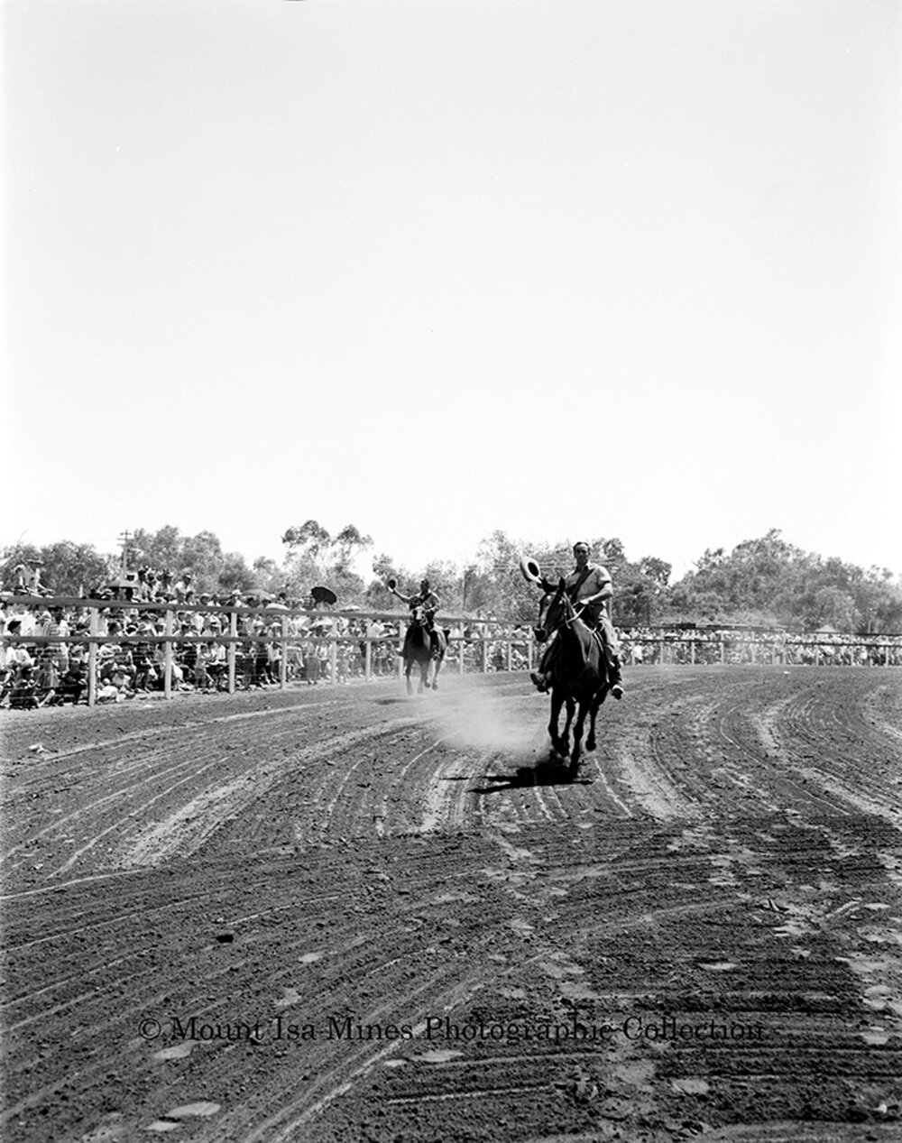 Mount Isa Rotary Rodeo Rough Riding, Spear Creek, September 1959