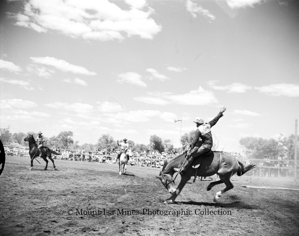 Mount Isa Rotary Rodeo Rough Riding, Spear Creek, September 1959