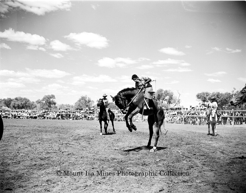 Mount Isa Rotary Rodeo Rough Riding, Spear Creek, September 1959