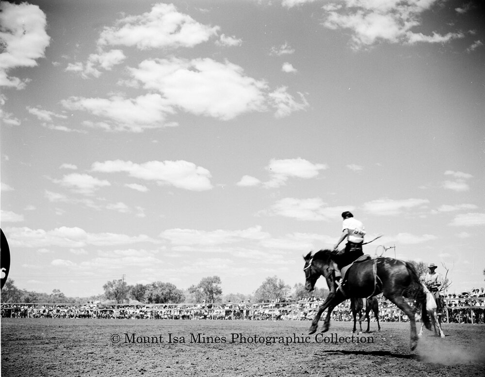 Mount Isa Rotary Rodeo Rough Riding, Spear Creek, September 1959