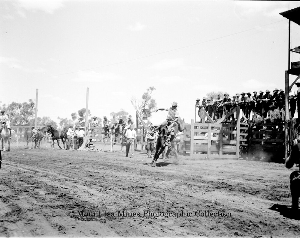 Mount Isa Rotary Rodeo Rough Riding, Spear Creek, September 1959