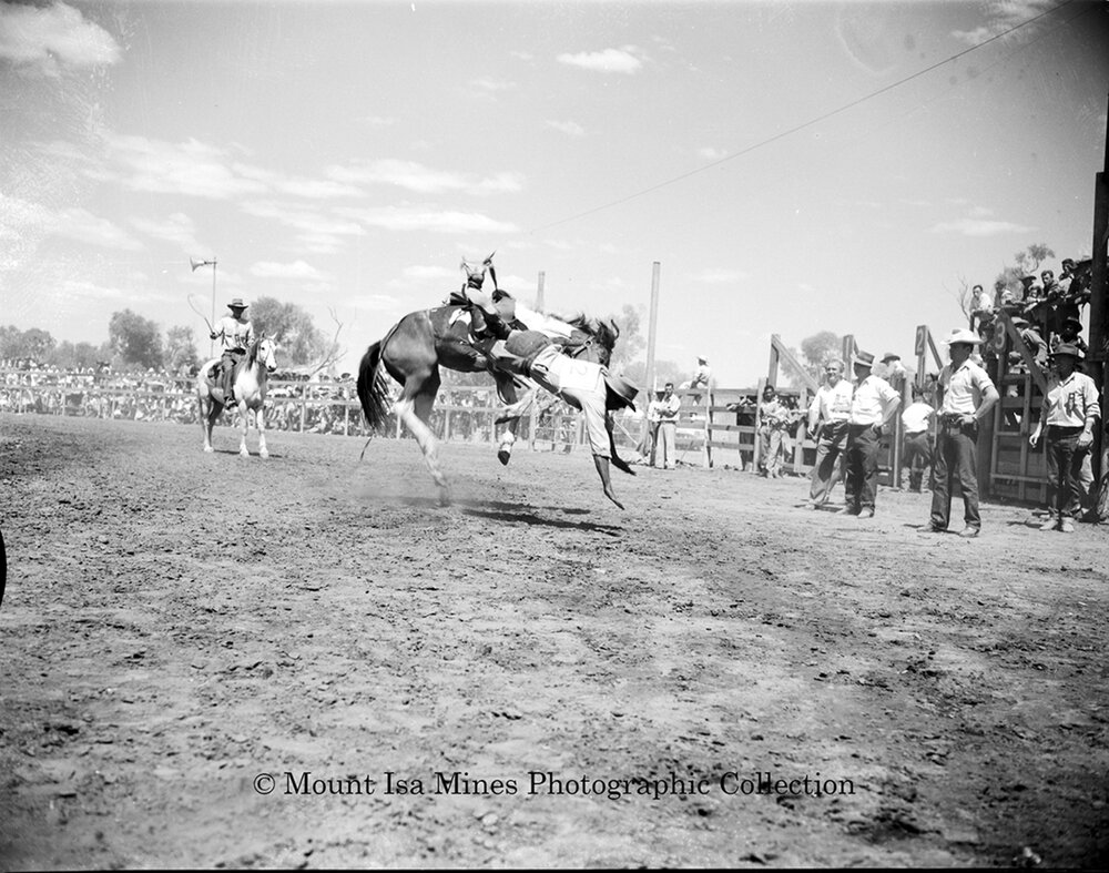 Mount Isa Rotary Rodeo Rough Riding, Spear Creek, September 1959