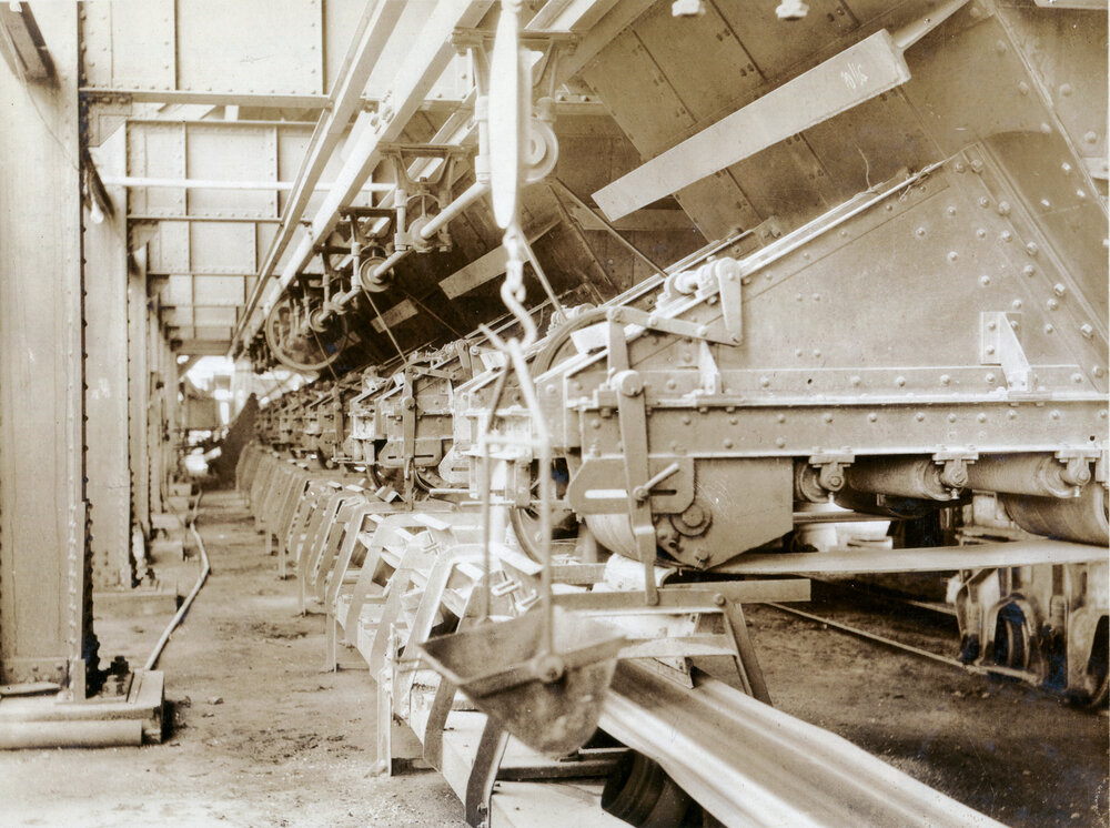 Belt feeders in lead smelter, Mount Isa Mines, c.1932