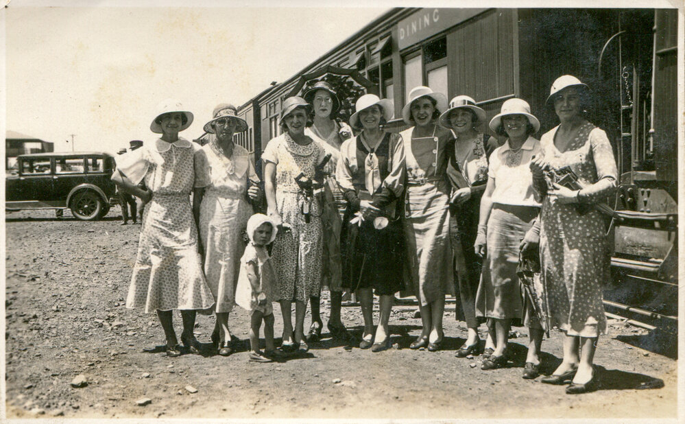 Ladies at the dining car of the rattler, Mount Isa Railway Station, c.1933