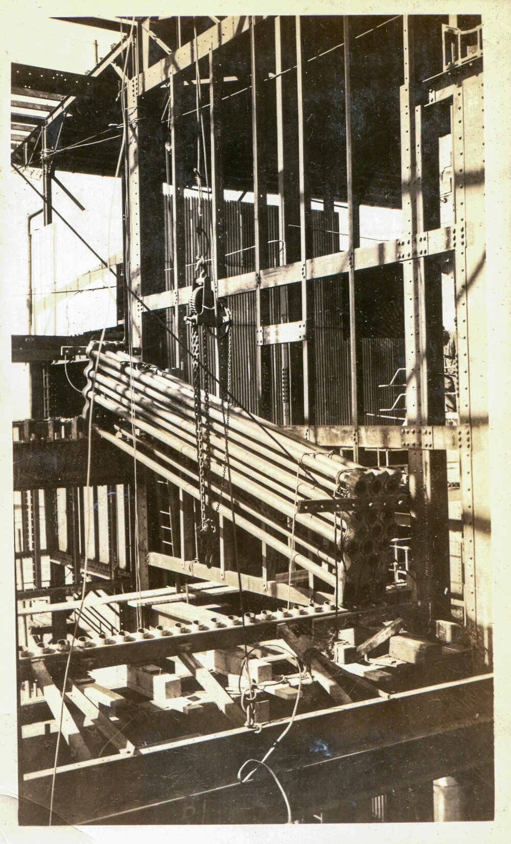 Installing boiler tubes at Mines Power Station Expansion, Mount isa Mines, c.1936