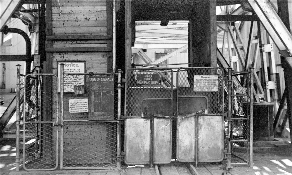 Man and Supply Cage, Mount Isa Mines, c.1951