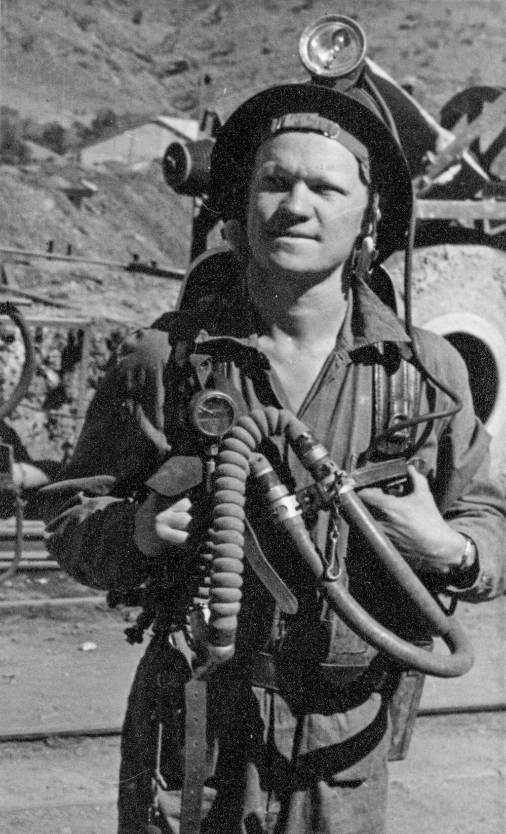 Peter Laurisen with mine rescue McCarr breathing apparatus, c.1951