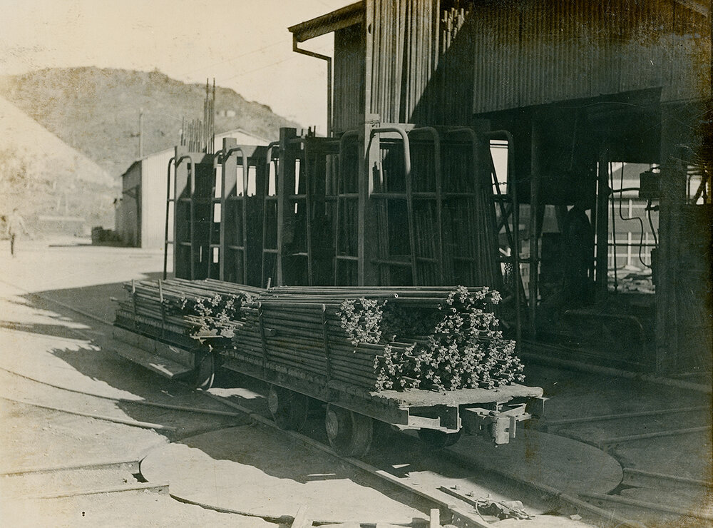 Drill steels at tool sharpening shop, Mount Isa Mines