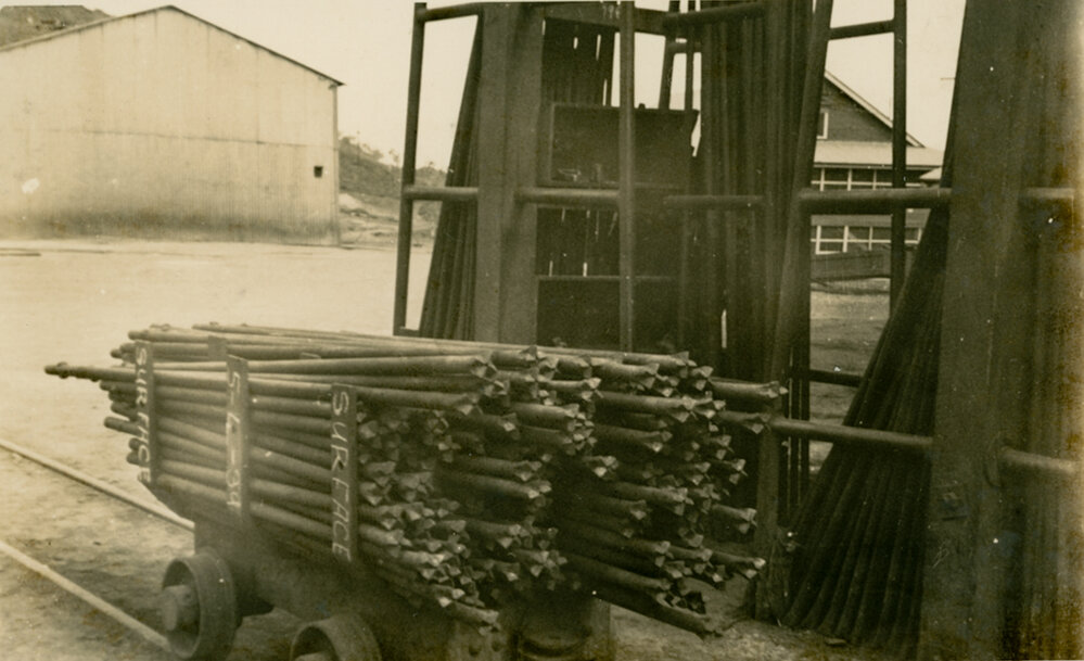 Drill steels at tool sharpening shop, Mount Isa Mines