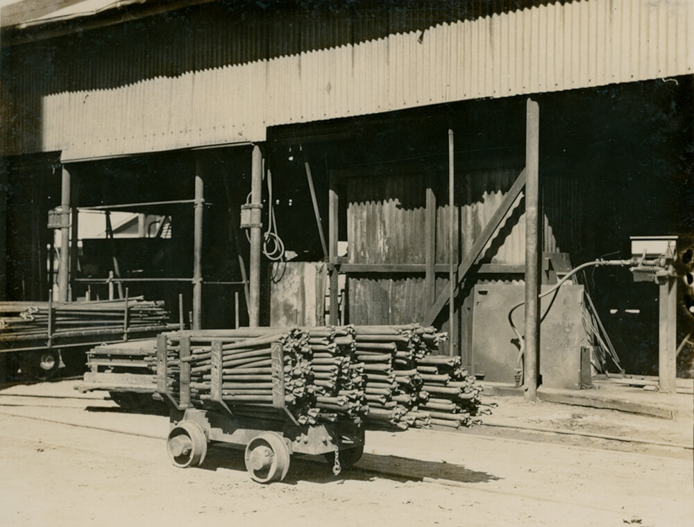 Drill steels at tool sharpening shop, Mount Isa Mines