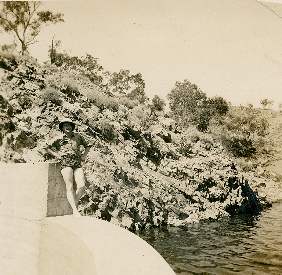 Man standing at experimental dam