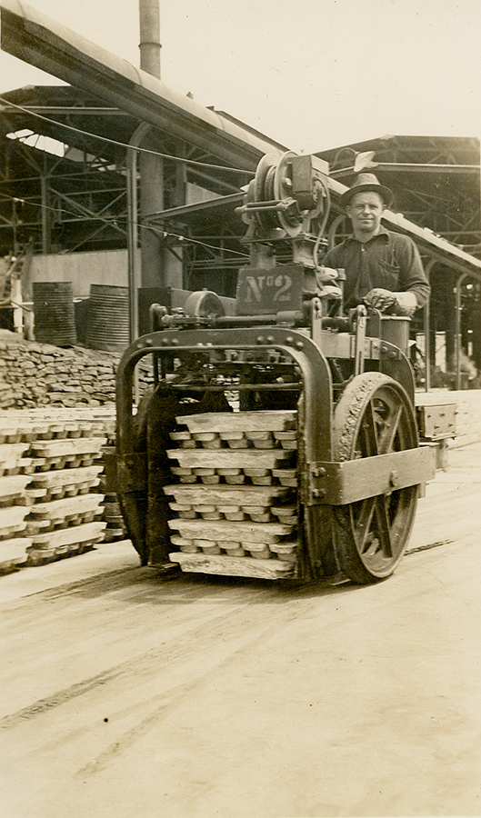 Loading lead ingots with electric lead buggy, Lead Smelter