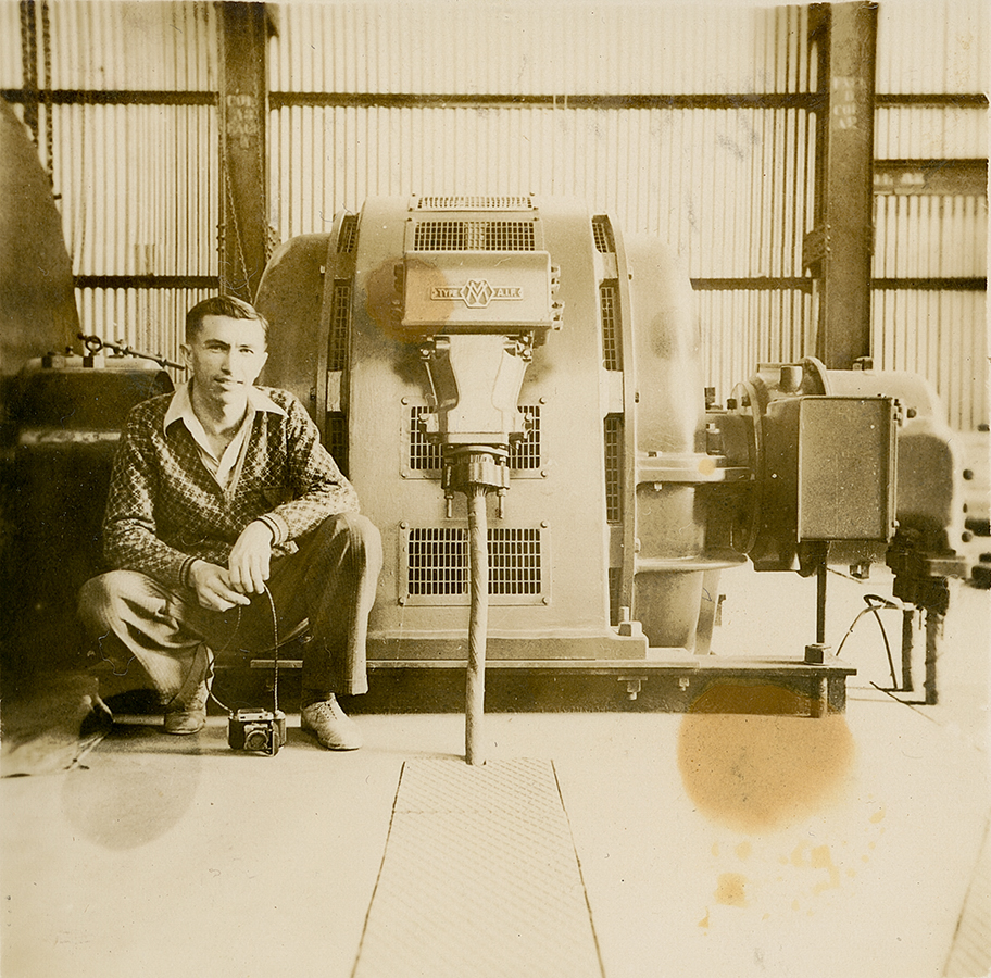 Photographer at Winder Motor for borehole ropeway No 2 Ore Shaft