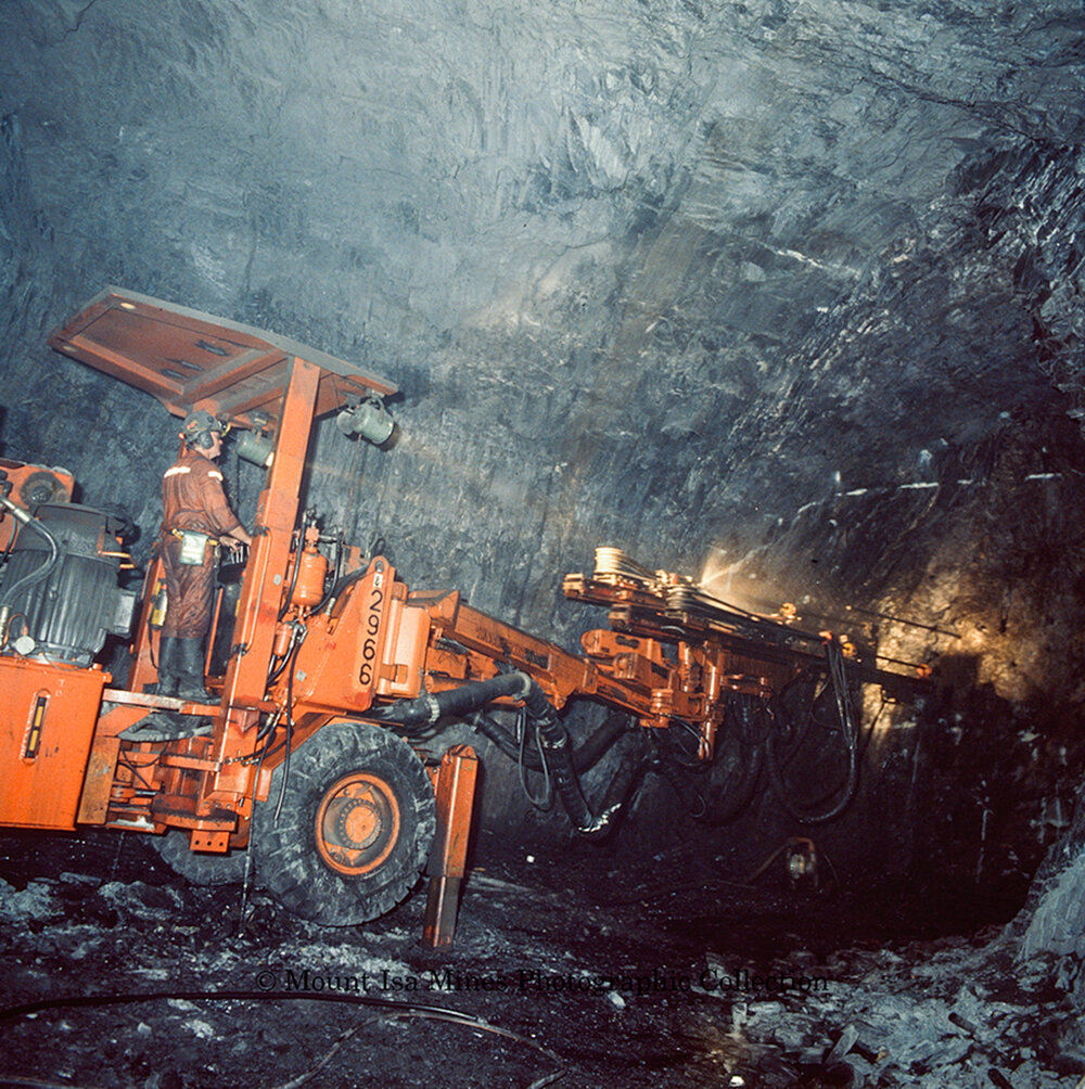 T62 Decline 3000 Orebody Tamrock jumbo drill in copper mine, Mount Isa Mines, January 1990
