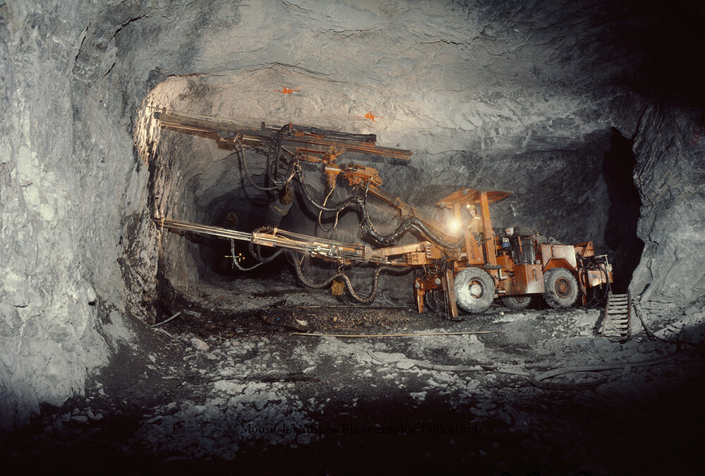 T62 Decline Tamrock 2 Boom Drill Rig in copper mine, Mount Isa Mines, September 1989