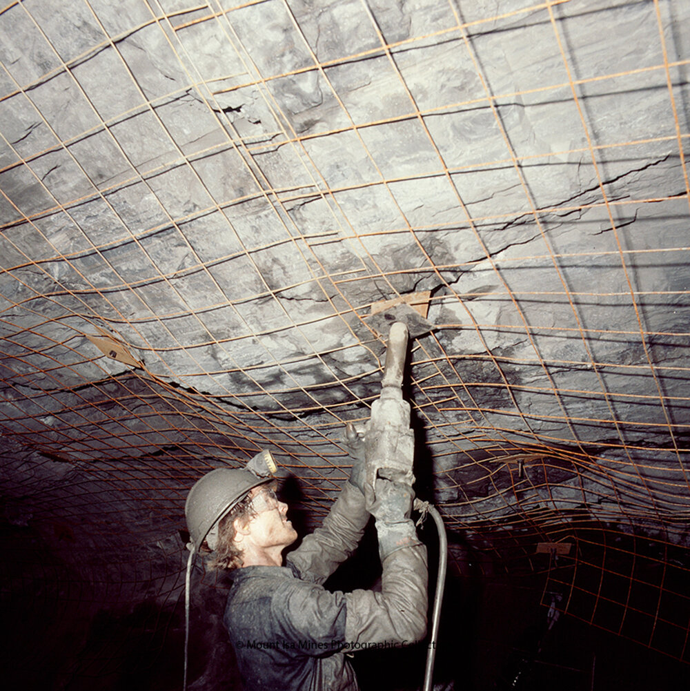 Tensioning bolts in copper mine, Mount Isa Mines, c.1986