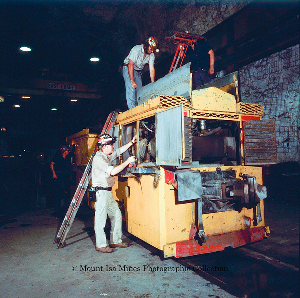 Underground loco being serviced in copper mine, Mount Isa Mines, c.1980s