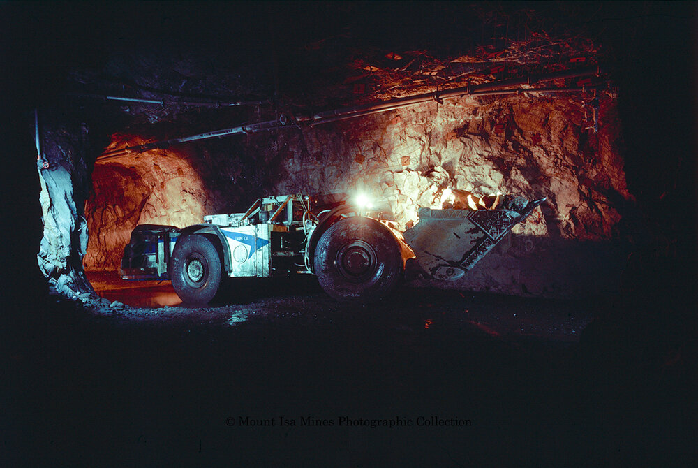 Underground mucker unit in copper mine, Mount Isa Mines, c.1987