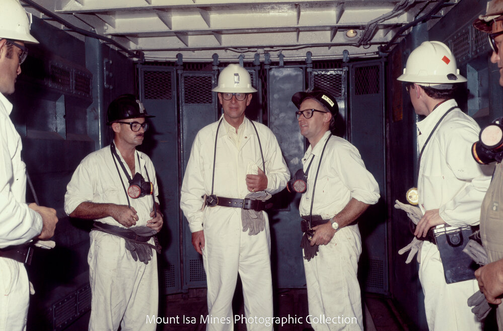 Prince Philip in main R62 cage going underground, Mount Isa Mines, April 1970