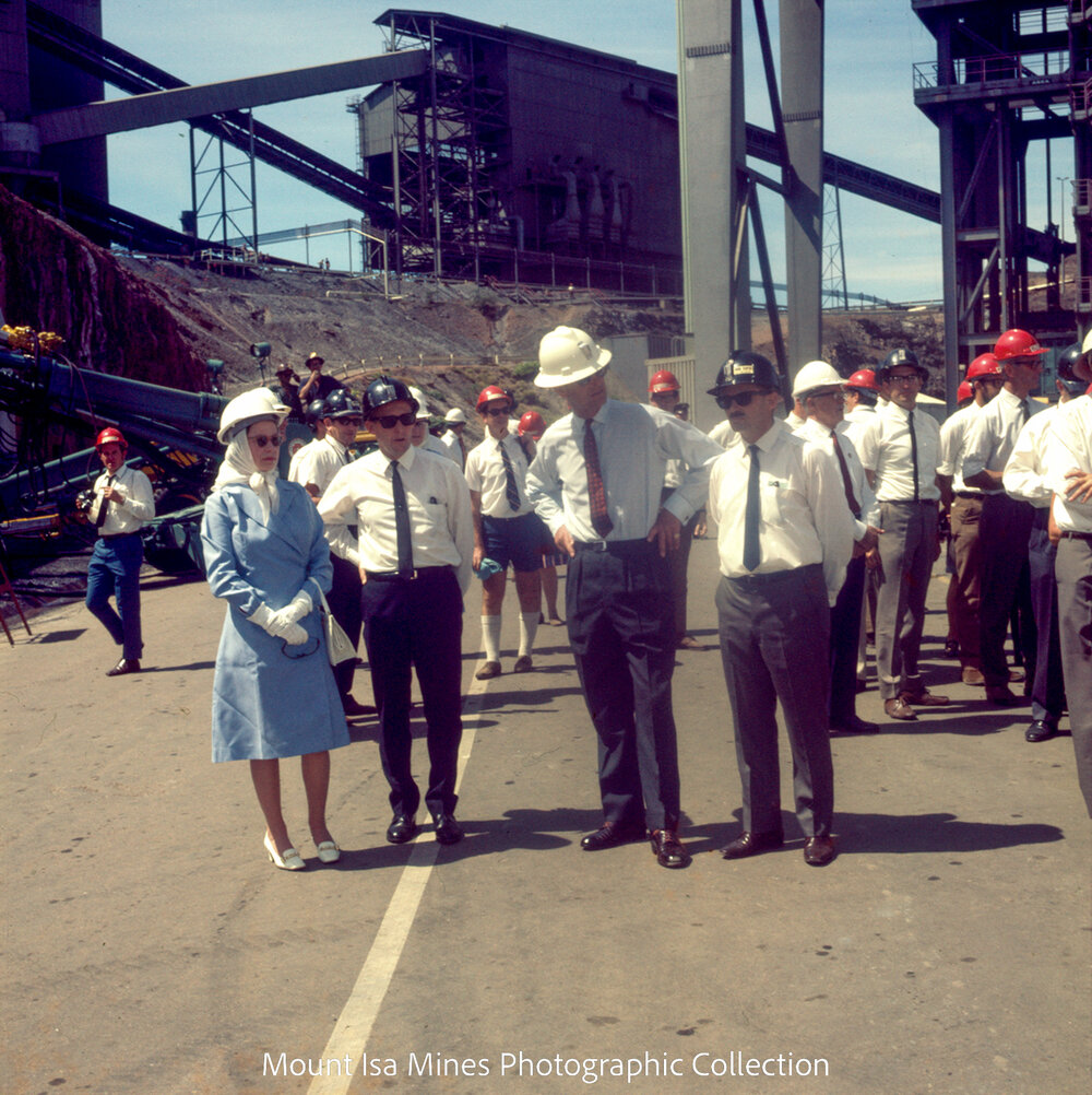 Queen Elizabeth II and Prince Philip inspect machinery at R62 Marshalling Area, Mount Isa Mines, April 1970