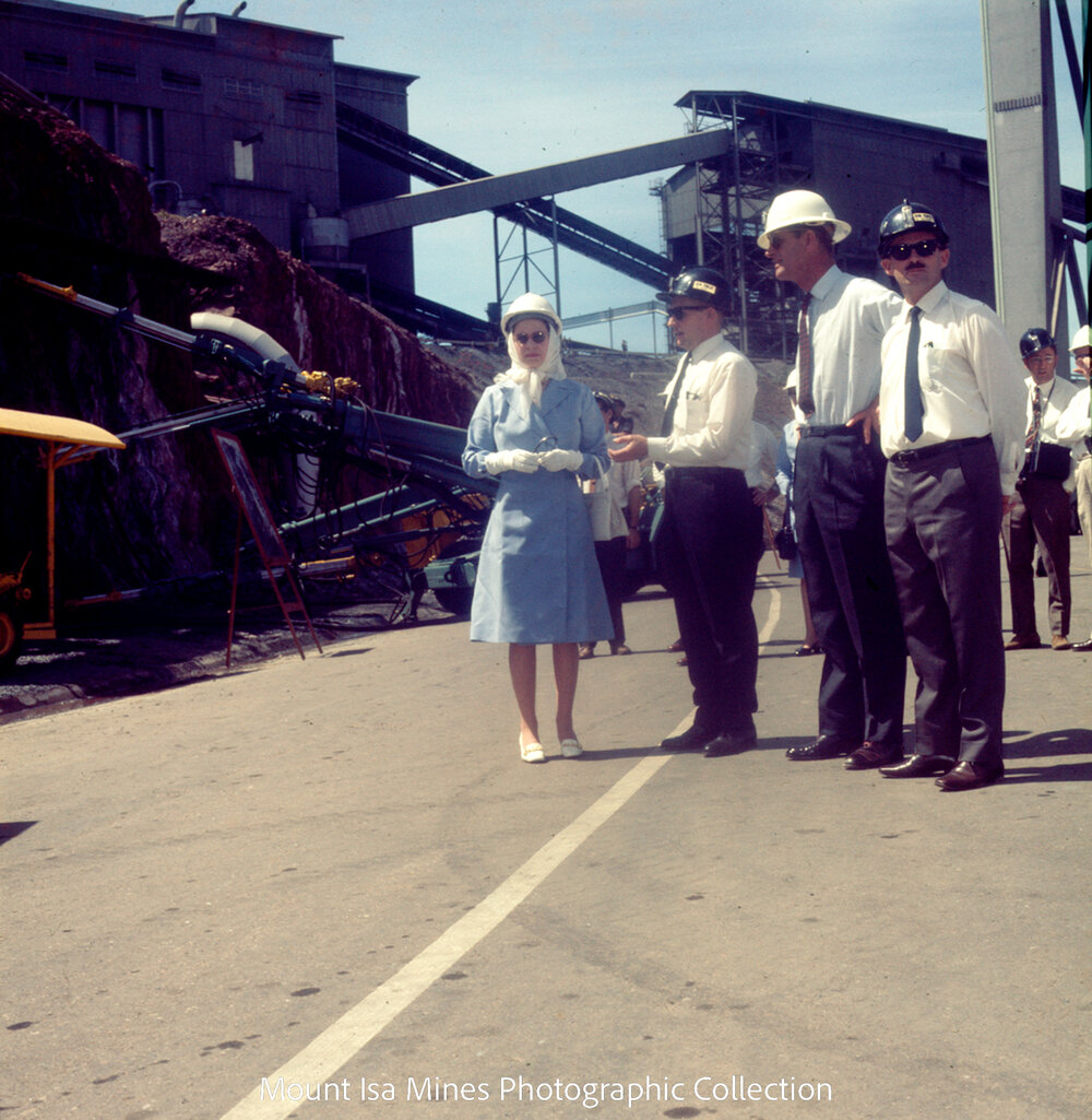 Queen Elizabeth II and Prince Philip inspect machinery at R62 Marshalling Area, Mount Isa Mines, April 1970