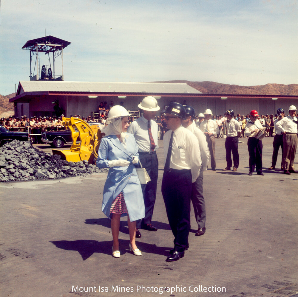 Queen Elizabeth II, Prince Philip, and Ken Finlay inspect machinery R62 Marshalling Area, Mount Isa Mines, April 1970